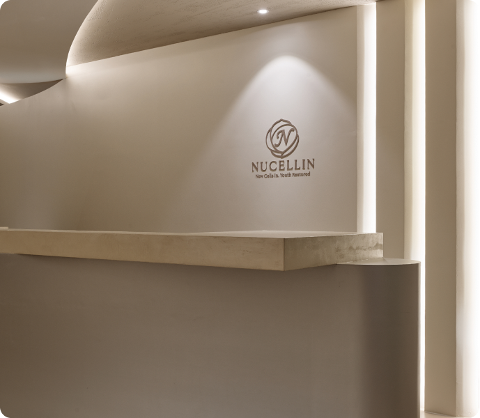 Softly lit corridor with Nucellin brand signage at the orthopedic clinic in Seoul